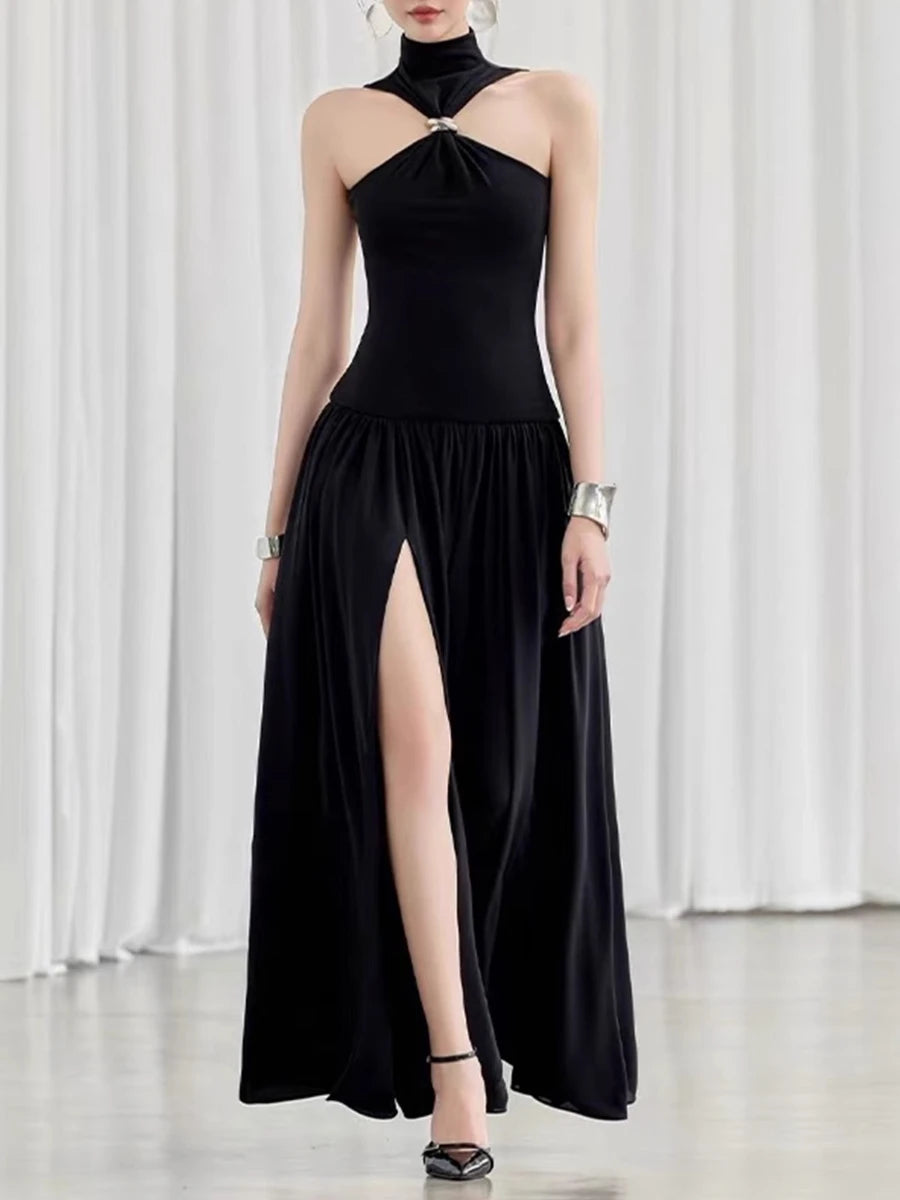Black halter neck dress with a high slit 