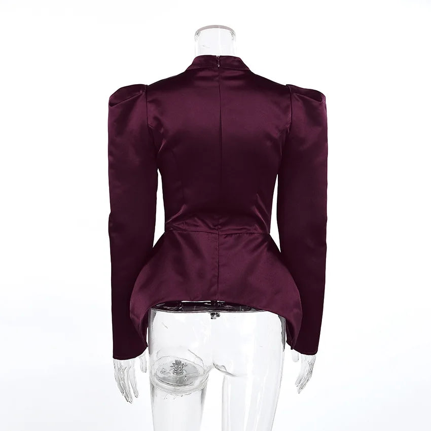 Maroon off-shoulder top on a mannequin against a white background