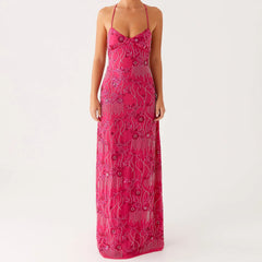 Pink embroidered dress on a white background