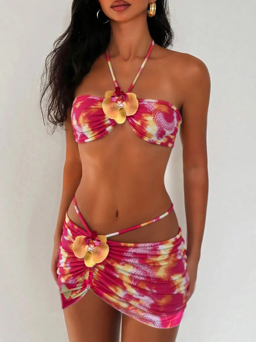 Back view of the embellished swimwear set.