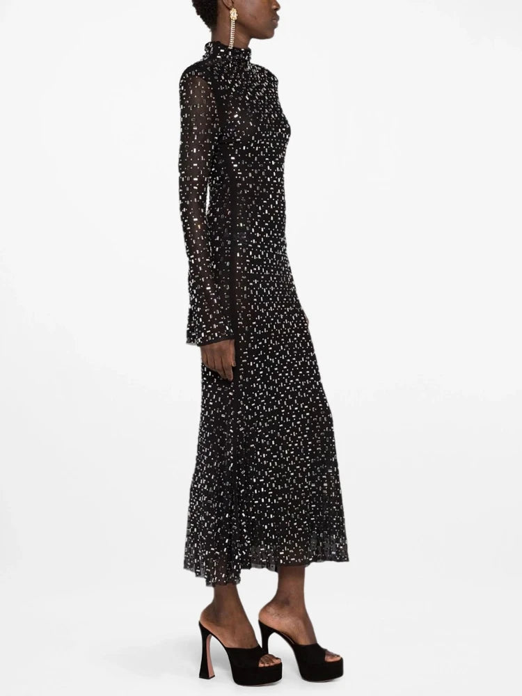Crystal embellished turtleneck midi dress on a model, side view.