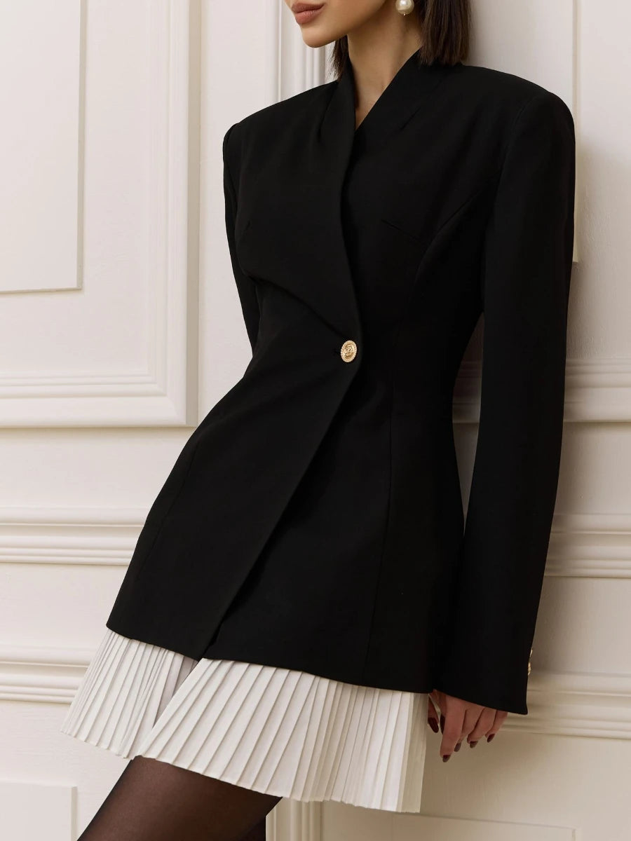 Black blazer with golden buttons worn by a model