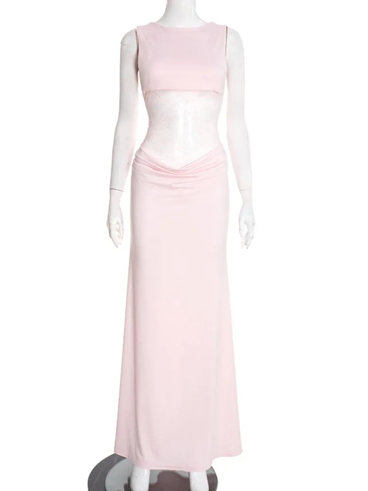 Mannequin wearing a light pink dress on a white background