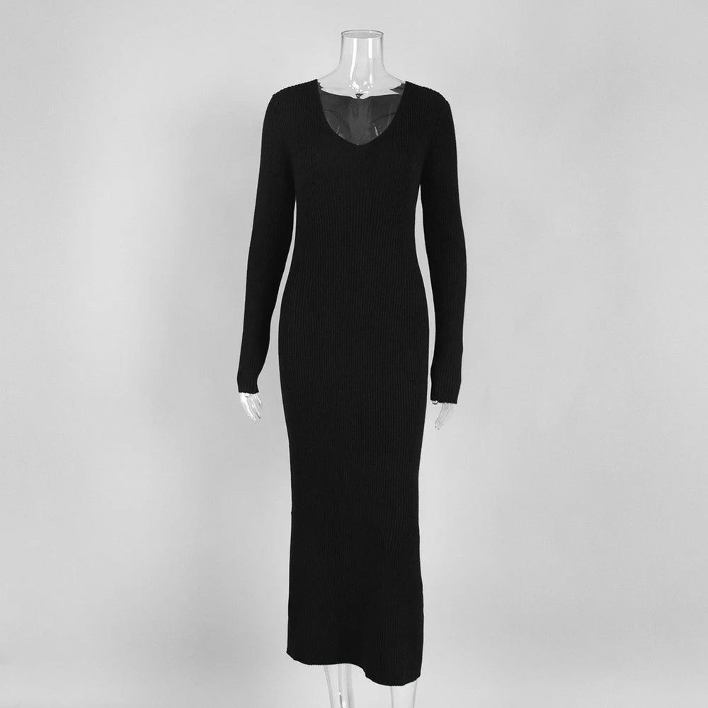Black dress on a mannequin against a white background