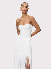 Close-up of white spaghetti strap fringe maxi dress bodice
