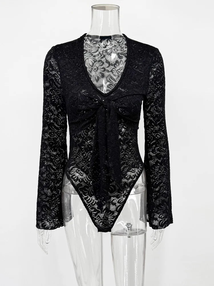 Black floral lace bodysuit on a mannequin against a white background