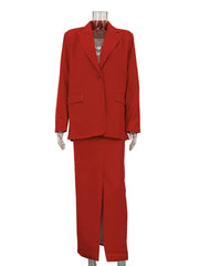 Red suit on a mannequin against a white background