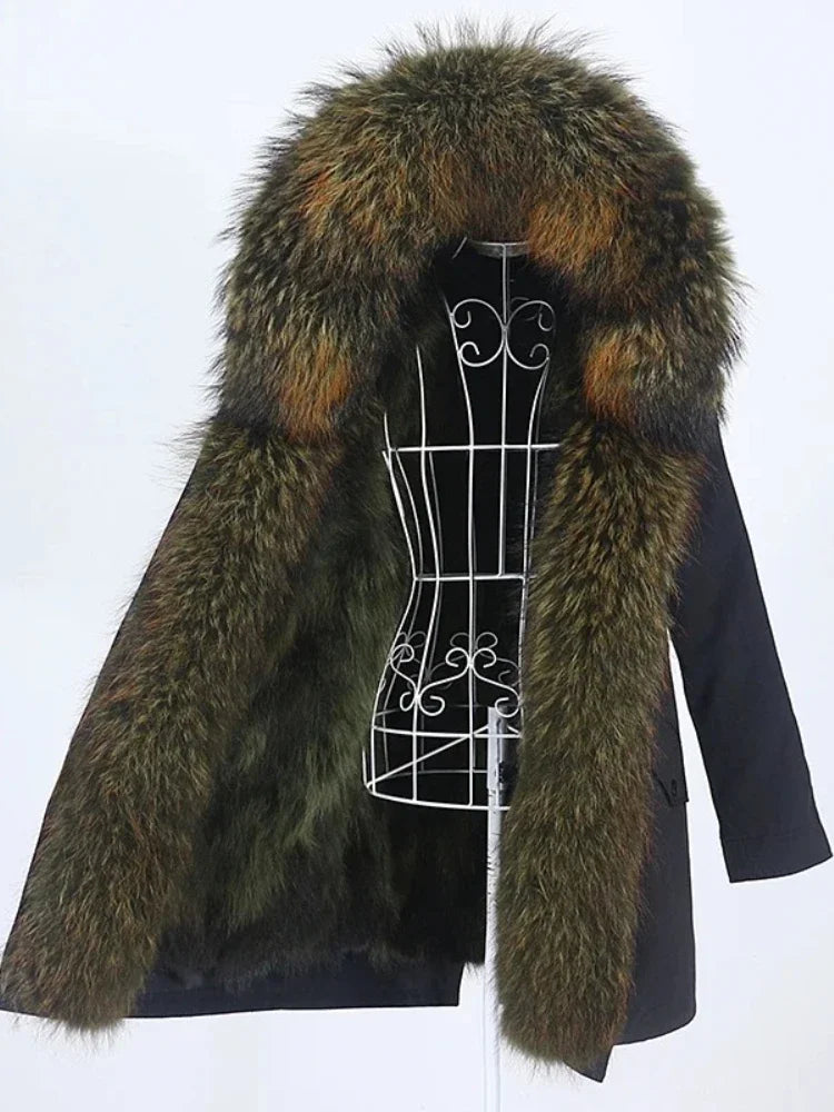 Coat with a fur hood on a mannequin against a white background