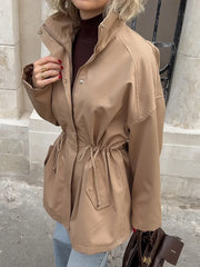 Drawstring waist standing collar jacket close-up