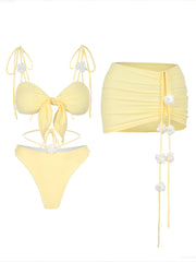 Yellow bow tie triangle bikini top and ruched skirt two-piece set with floral accents