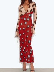 Tie neck maxi dress with flare sleeves and red base print.