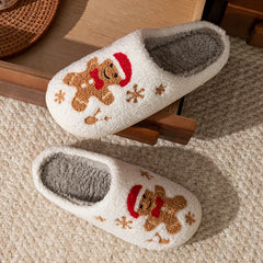 Pair of gingerbread man slippers leaning against a wall