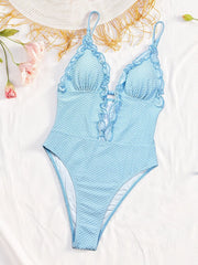Textured ruffled trim one-piece swimsuit laid flat