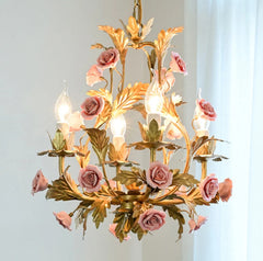 Decorative chandelier with floral design on a light background