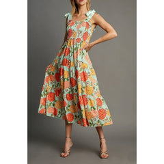 Light blue floral print smocked square neck maxi dress with tie shoulder straps.