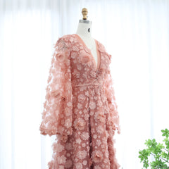 Mannequin displaying  the blush pink 3D floral gown, showcasing its elegant silhouette and romantic bell sleeves. Golden Atelier 4