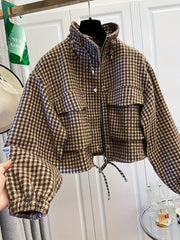 Houndstooth print cropped bomber jacket with stand-up collar and drawstring hem, front view.