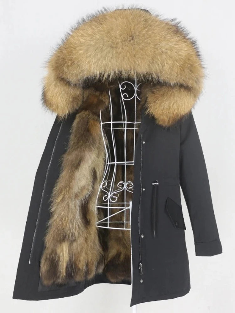 Black coat with fur hood and fur trim on a mannequin against a white background