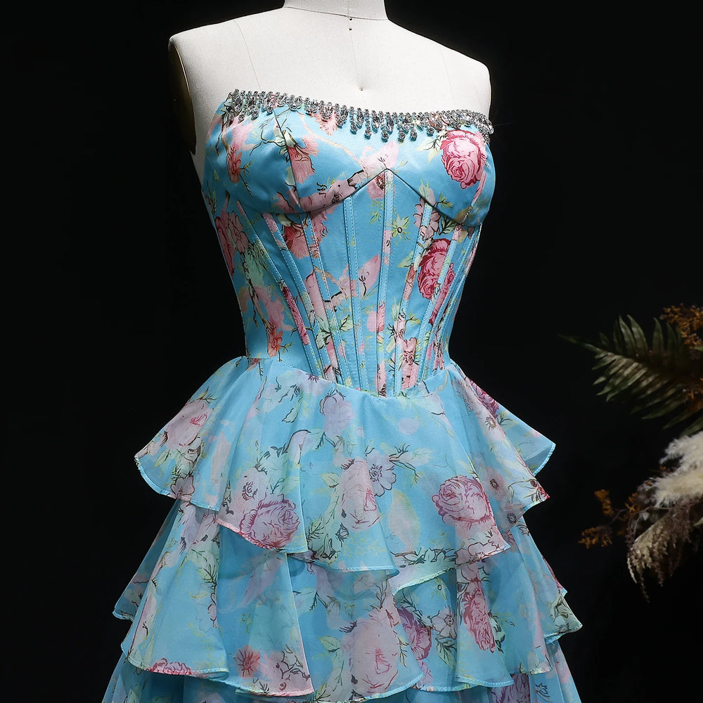 Floral dress on a mannequin against a dark background