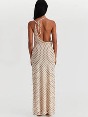 Polka dot maxi dress with backless design and spaghetti straps for evening parties