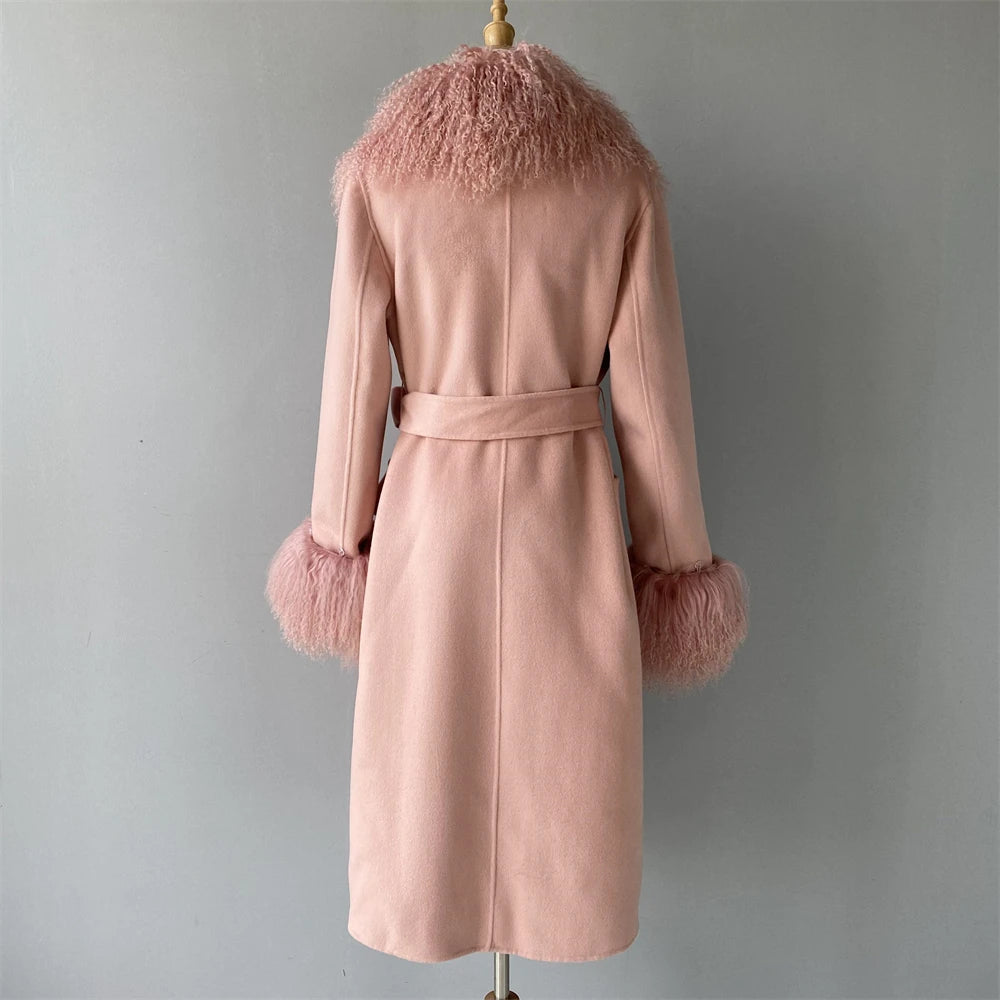 Pink coat with fur trim on a mannequin against a gray background