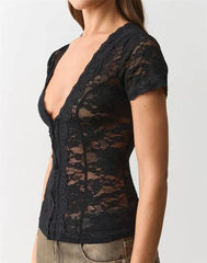 Side view of black lace v-neck short sleeve top