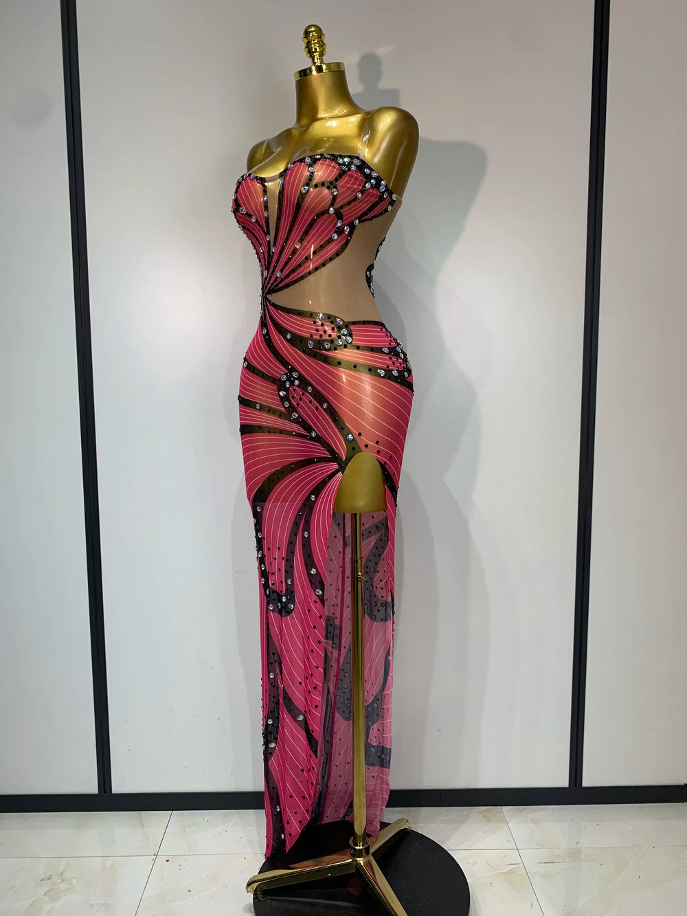 Strapless maxi dress with butterfly print and rhinestone embellishments.