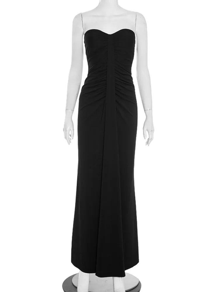 Black strapless gown on a mannequin against a white background