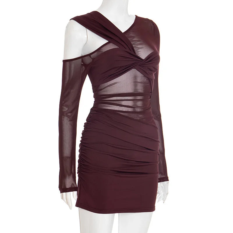 Maroon dress with sheer sleeves on a mannequin against a white background