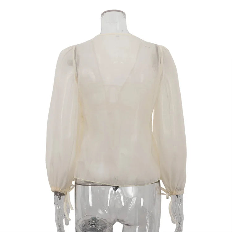 White blouse on a mannequin against a white background