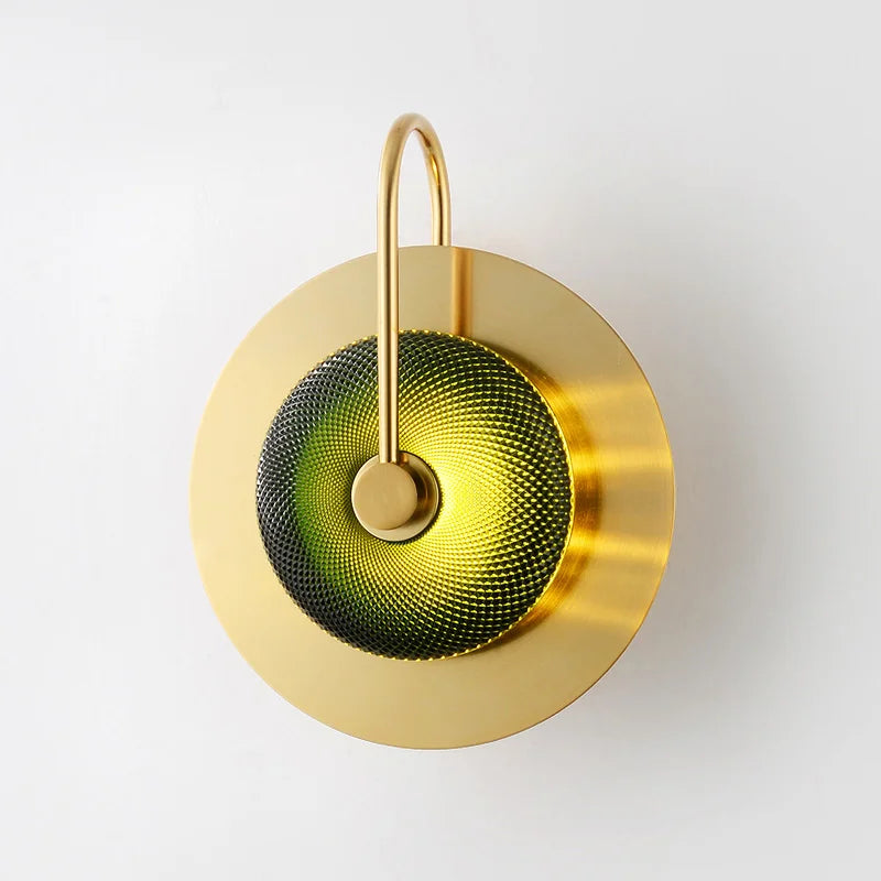 A close-up of the Golden Atelier Modern Wall Sconce, highlighting its unique design and luxurious materials. A