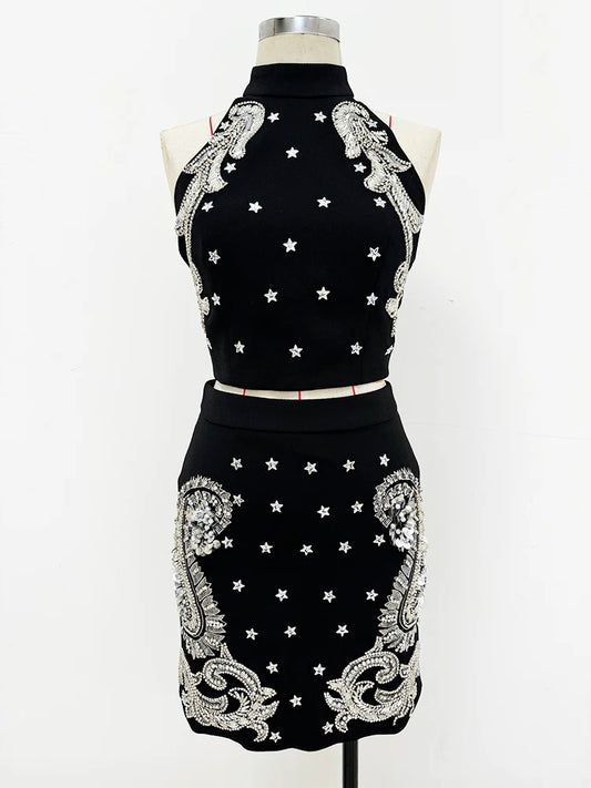 Beaded paisley halter neck crop top and mini skirt on mannequin