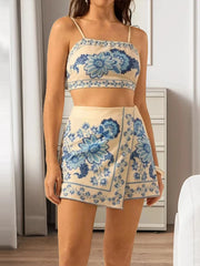 Woman wearing a floral two-piece set in a room with neutral decor