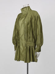 Olive green lantern sleeve mini dress on mannequin side view