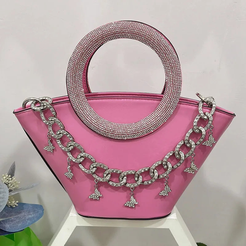 Pink crystal handle trapezoid tote bag with silver chain detail