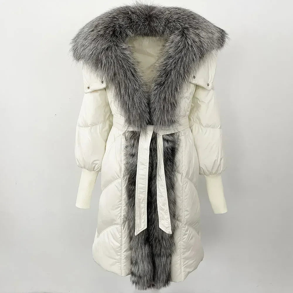 White winter coat with a long gray fur trim on a white background