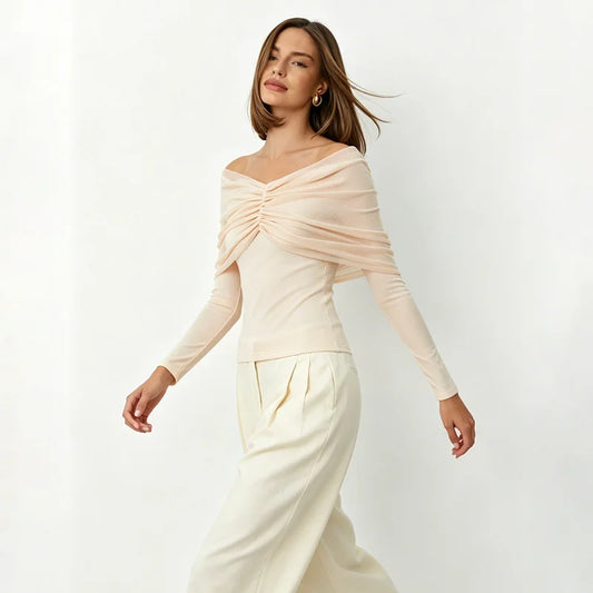 Off-shoulder pleated mesh top in motion