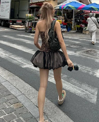  Women's mini dress with a leopard print and patchwork details.