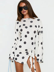 Polka dot long sleeve ruched mini dress with front tie detail