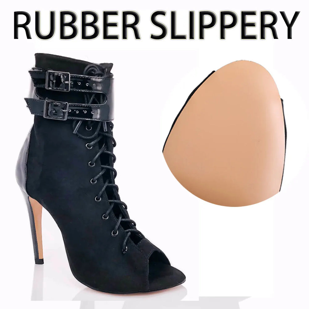 Black lace-up high-heeled boot with a tan insole on a white background, labeled 'Rubber Slippery'.