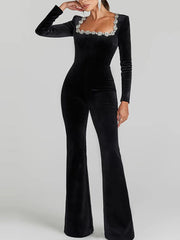 Black velvet diamond studded flared jumpsuit.

