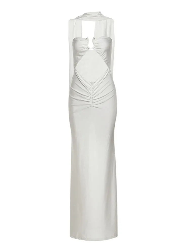 White evening gown with a sheer overlay on a white background