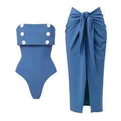 Strapless swimsuit with decorative buttons and a blue wrap skirt