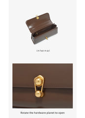 Structured Leather Shoulder Bag with Metal Clasp