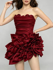 Strapless ruffled flower mini dress with hand on hip