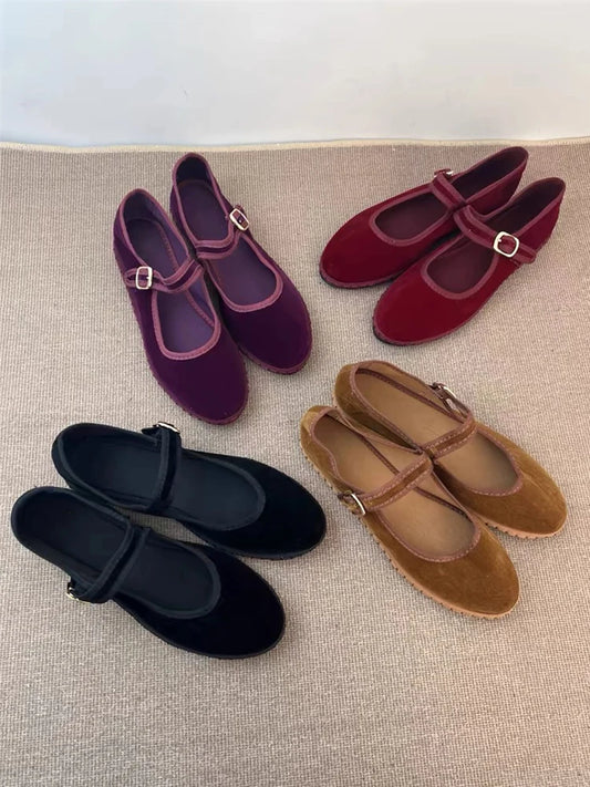 Velvet Mary Jane flats in various colors including purple, red, black, and tan.