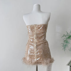 Strapless sequin mini dress with feather trim, back view
