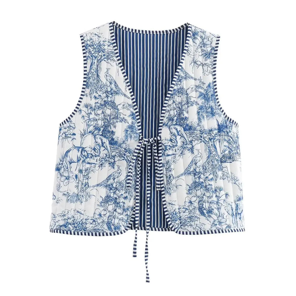 Front view of pink patchwork floral print quilted vest