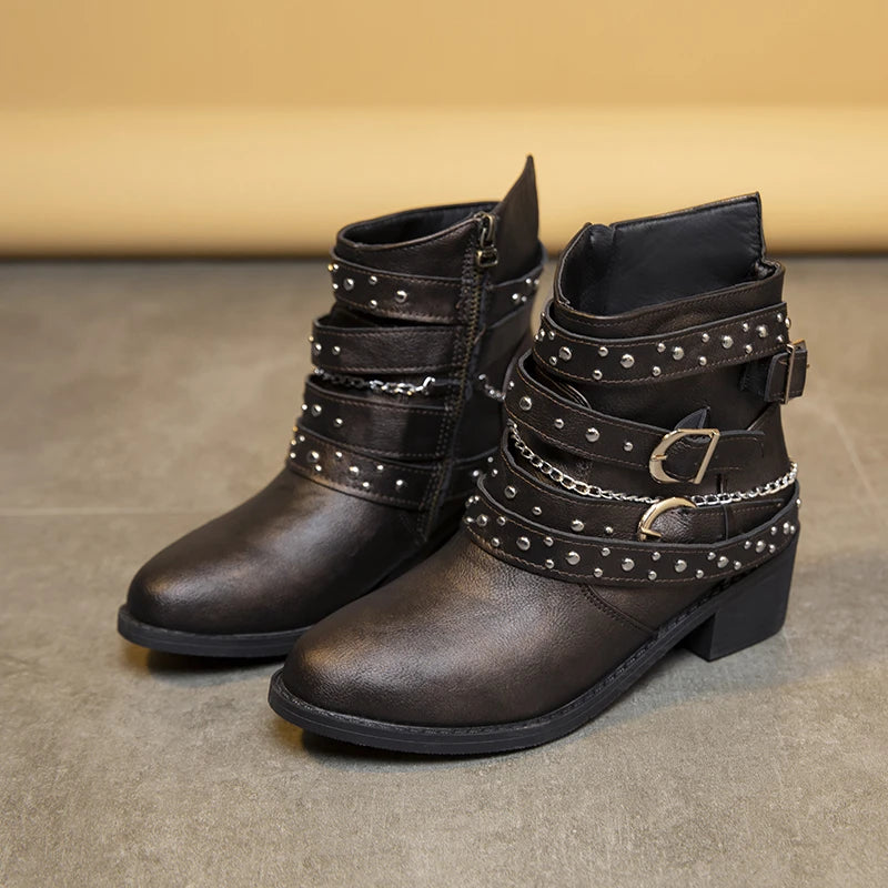 Close-up of a Golden Atelier goth punk PU leather cowboy ankle boot, highlighting the unique details and buckle accents. 1 Brown