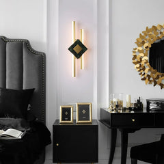 A modern marble LED wall lamp with a minimalist design, perfect for adding a touch of luxury to any room. B